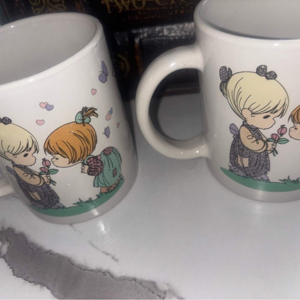 Set of two precious moments coffee mugs